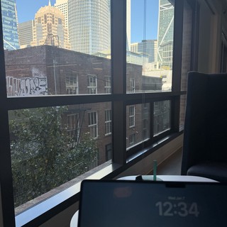 Urban Workspace with Downtown City Skyline View