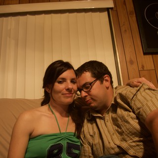 Couple Relaxing Together on Couch at Home