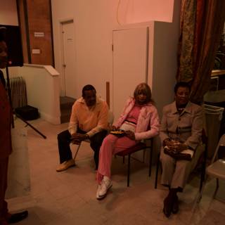 Pink Suited Freddie Stone Talks to a Group