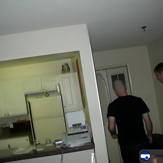 Two Men in a Kitchen