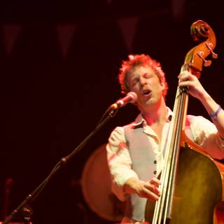 Ted Dwane performing on a cello at Coachella 2011