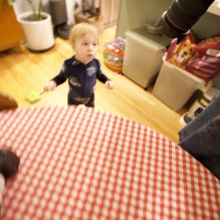 Toddler's Curious Gaze from Kitchen on Christmas Morning