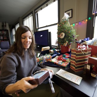Joyful Christmas Morning Gift Unwrapping at Home