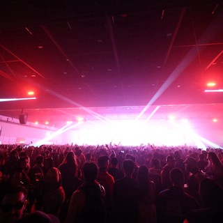 Massive Crowd Surges Toward Blazing Stage Lights