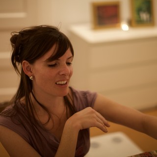 Penelope Smiling at an Art Gallery Evening