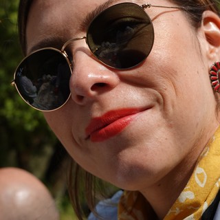 Summer Portrait with Round Sunglasses and Red Lipstick