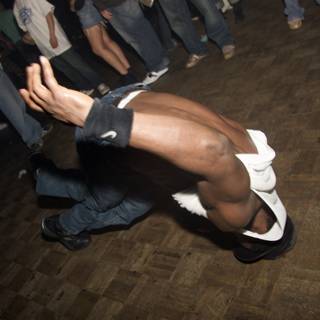 White-Shirt Breakdancing Man