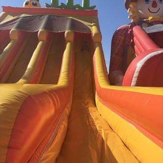 Towering Inflatable Slide at Outdoor Festival
