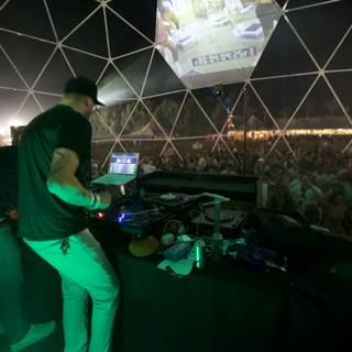 Crowd Captivated by DJ's Performance Under the Dome