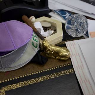 Baseball Hat and Papers