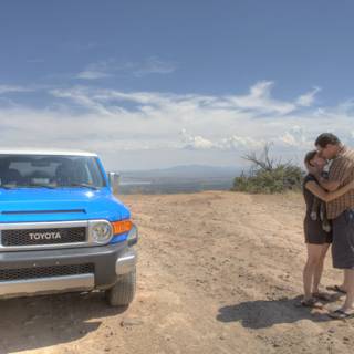 Love in the Backdrop of a Blue SUV