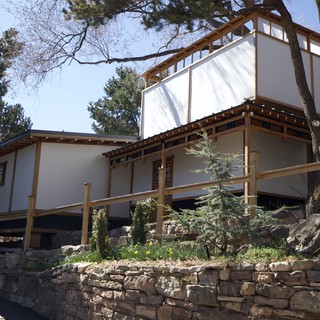Modern Adobe-Style Home with Asian-Inspired Architecture
