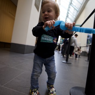 Toddler Playing at Baby Rave Event in Museum