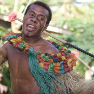 Traditional Fijian Dancer Holding Stick