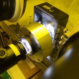 Making Light with a Precision Machine
