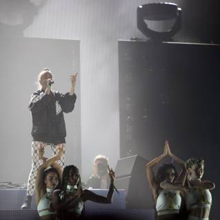 Man on Stage with Dancers at Coachella