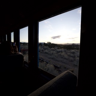 Desert Twilight Through Train Windows at Dusk