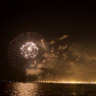 Spectacular Fireworks Display Lighting Up the Night Over Water