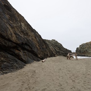 Secluded Cove Between Ancient Sea Cliffs at Dusk