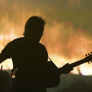 Fire & Strings: A Man's Musical Performance at Coachella
