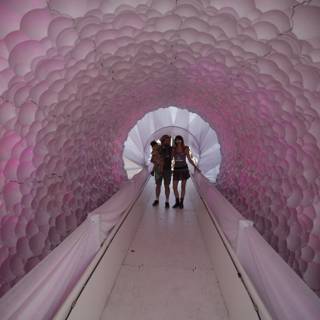 Walking Through a Pink Balloon Tunnel