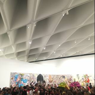Art Enthusiasts In Awe of Mural at The Broad Gallery