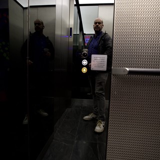 Self-Portrait in Modern Elevator Mirror - Urban Architecture