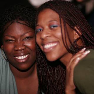 Two Women Feeling Happy and Relaxed in a Club