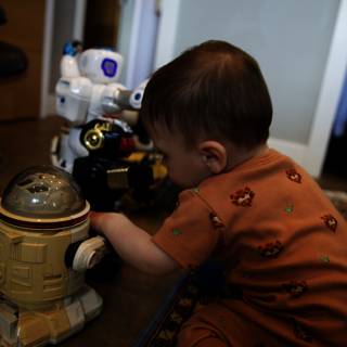 Adorable Baby Discovers the World of Robotics