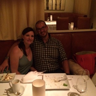 Couple Enjoying a Romantic Dinner at Restaurant