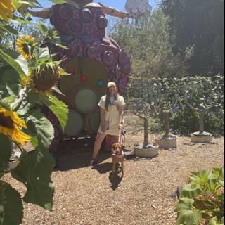 A Woman and Her Faithful Companion in a Lush Garden