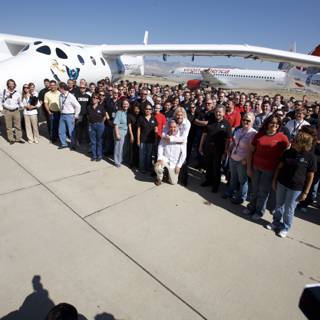 Richard Branson and team stand in front of White Knight Two