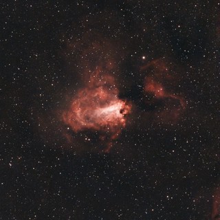 M17 Omega Nebula Glowing in Deep Space
