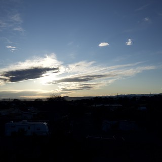 Dramatic Sunset Clouds Over Desert Southwest Landscape