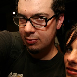 Two Friends Share a Close Moment at a Nightclub