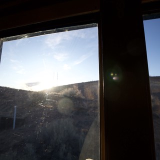 Sunset Through Dusty Windows in Abandoned Building