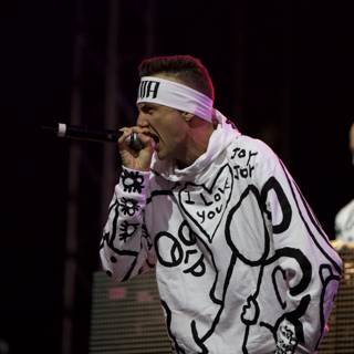 Hooded Performer With Microphone