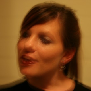 Motion Blur Portrait of Woman in Warm Light