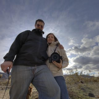 Couple Posing Amid Joshua Tree Desert Landscape