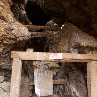 Wooden Shelter in Ancient Cave