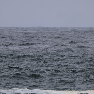Turbulent Grey Seas Under Overcast Skies