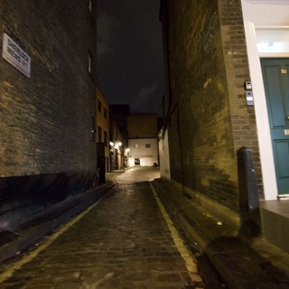 Atmospheric Night View of Narrow London Alleyway