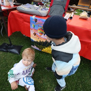 Toddlers Explore the Sonoma Balloon Classic Vendor Booth