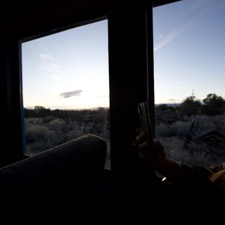 Desert Sunset View from Inside a Moving Bus