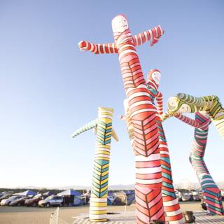 Vibrant Sculptures Brighten Parking Lot Scene