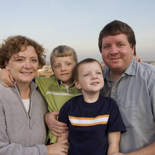 Family Portrait on Rooftop at Dusk