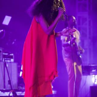 Solange Rocks the Stage in a Red Dress