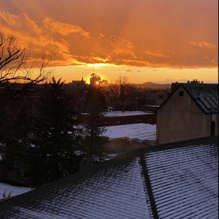Sunset over a Snowy Rooftop