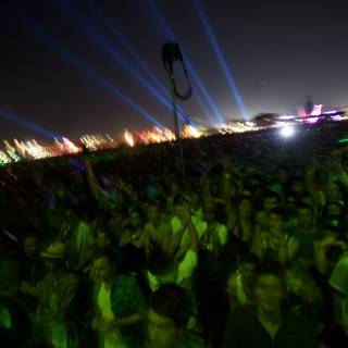 Lights Illuminate Ecstatic Crowd at Music Festival