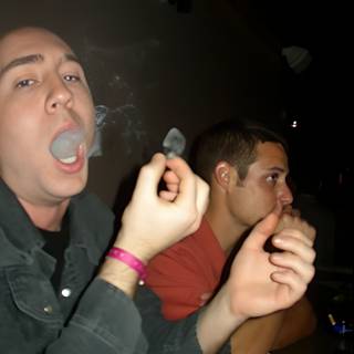 Two Men Enjoying a Smoke Break